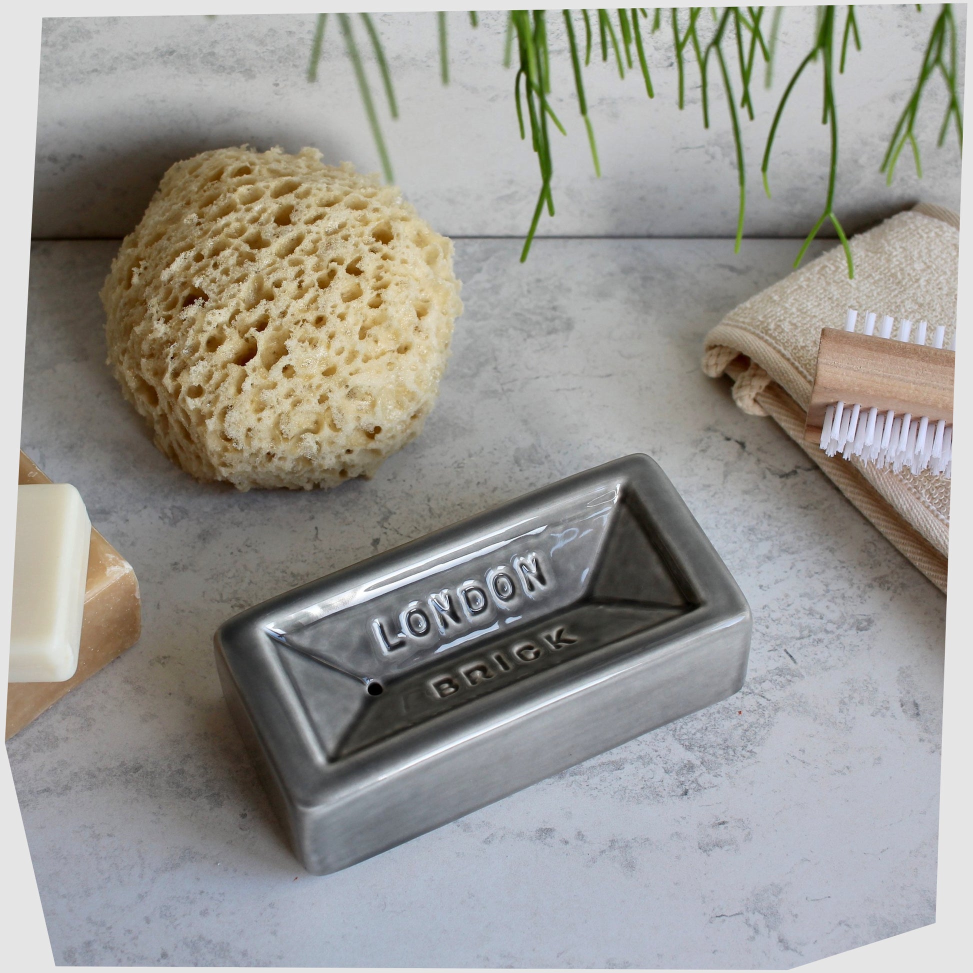 dark-grey-ceramic-soap-dish-in-the-form-of-an-iconic-london-brick