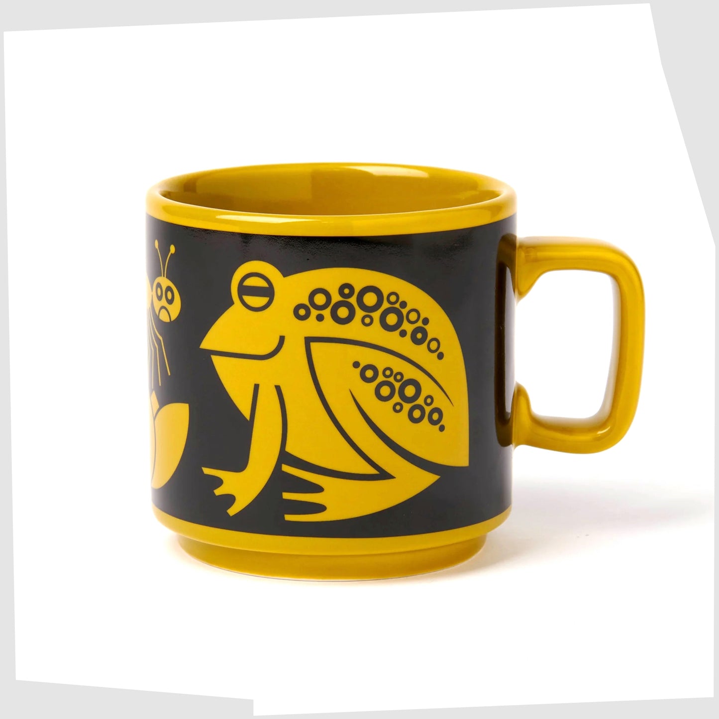 magpie x hornsea frog mug. Charteuse yellow mug featuring an illustration of two frogs surrounding a bug on a flower