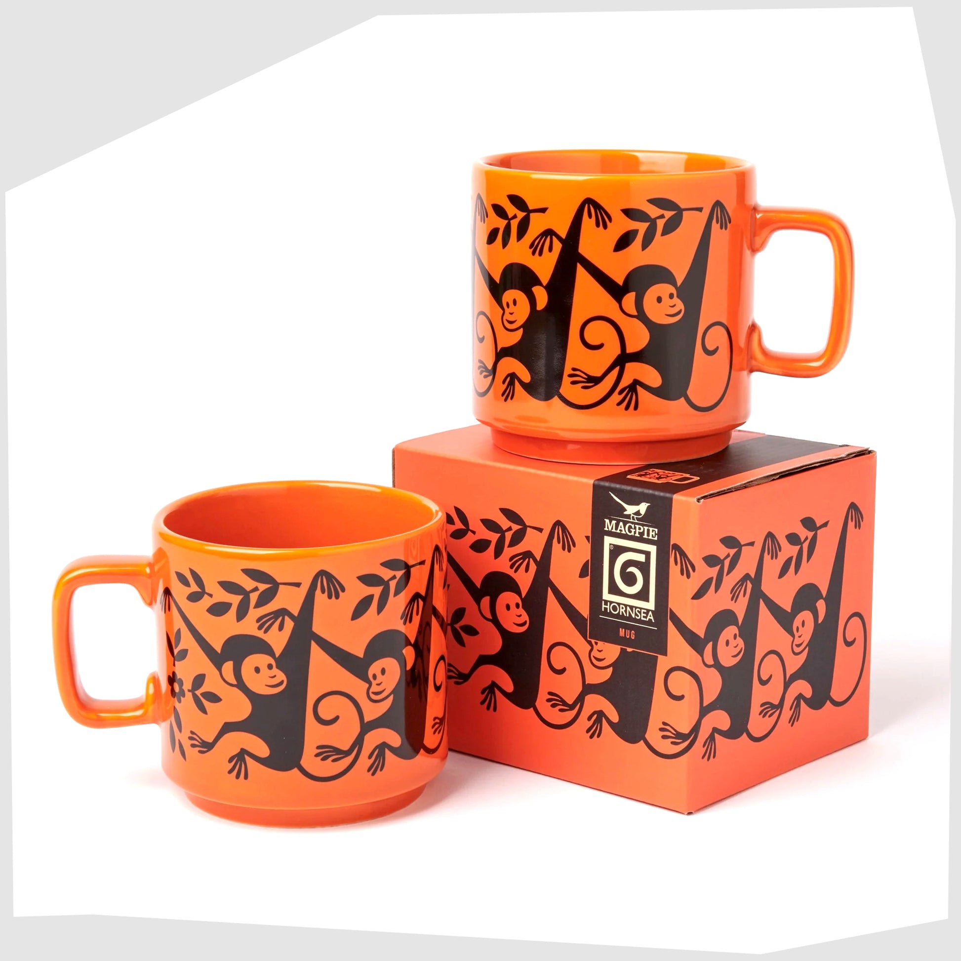 magpie x hornsea pottery monkey mug, orange stoneware mug shown with its printed gift box