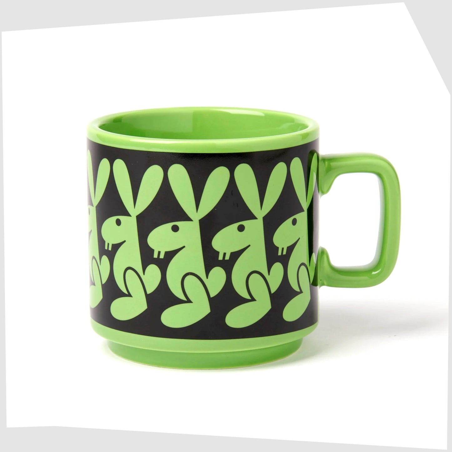 magpie x hornsea pottery rabbit mug. Green stoneware mug with black repeating pattern of a bunny rabbit.