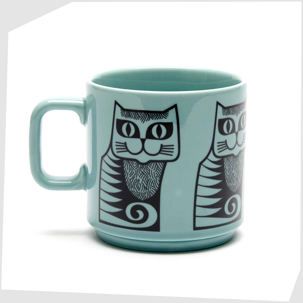 teal glazed ceramic mug with a black print of a cat made by Magpie X Hornsea Pottery