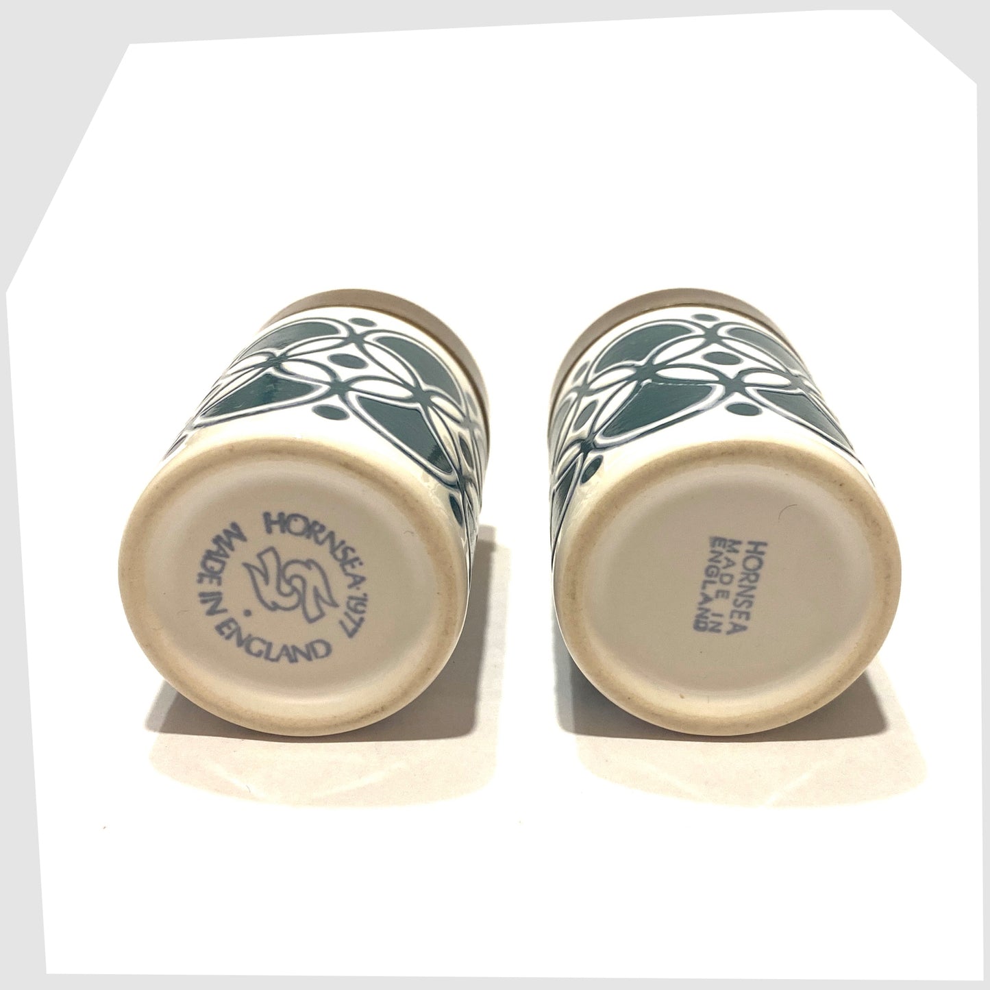base of the vintage hornsea pottery salt and pepper set in white with teal geometric pattern