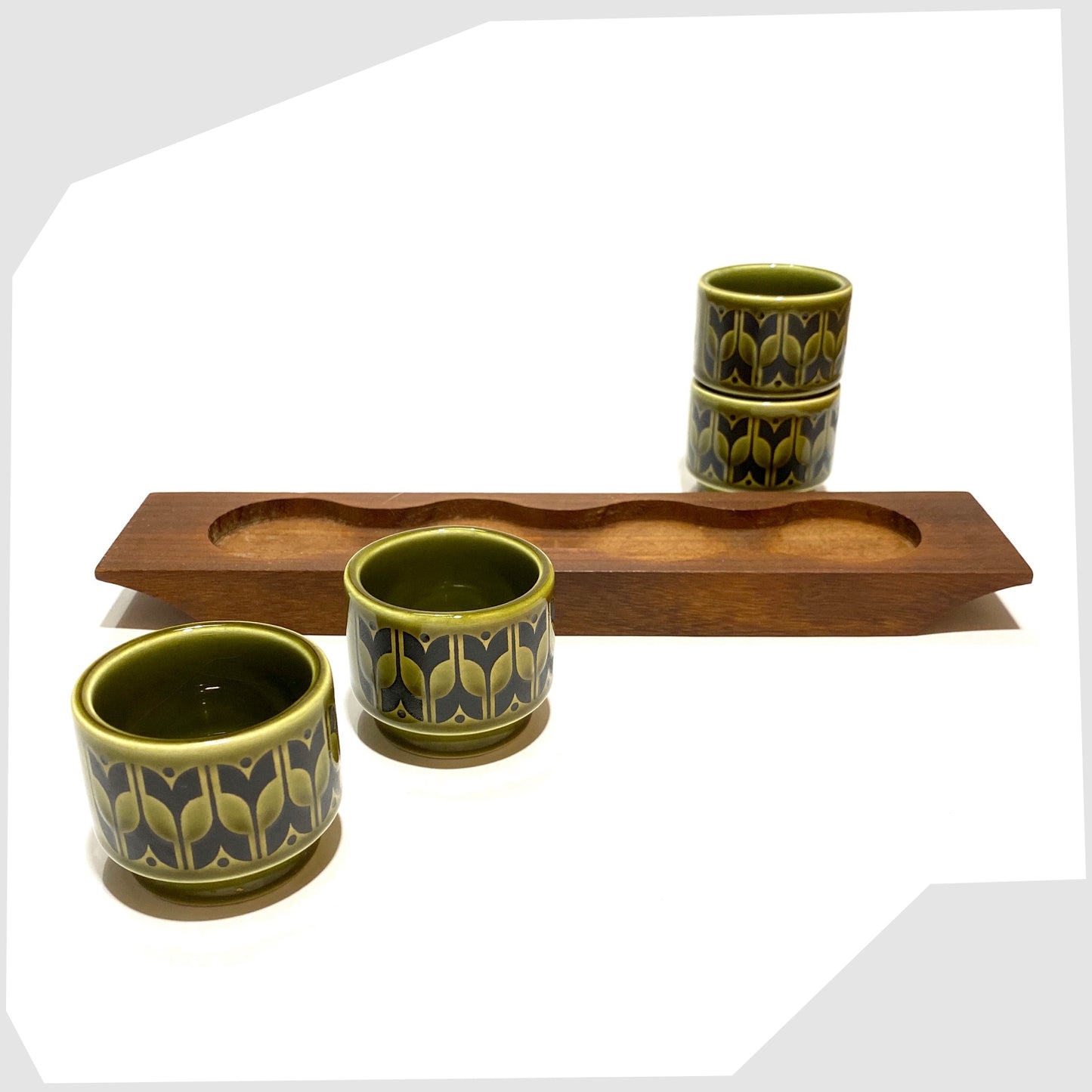 four hornsea pottery heirloom egg cups in lakeland green with teak wooden holder