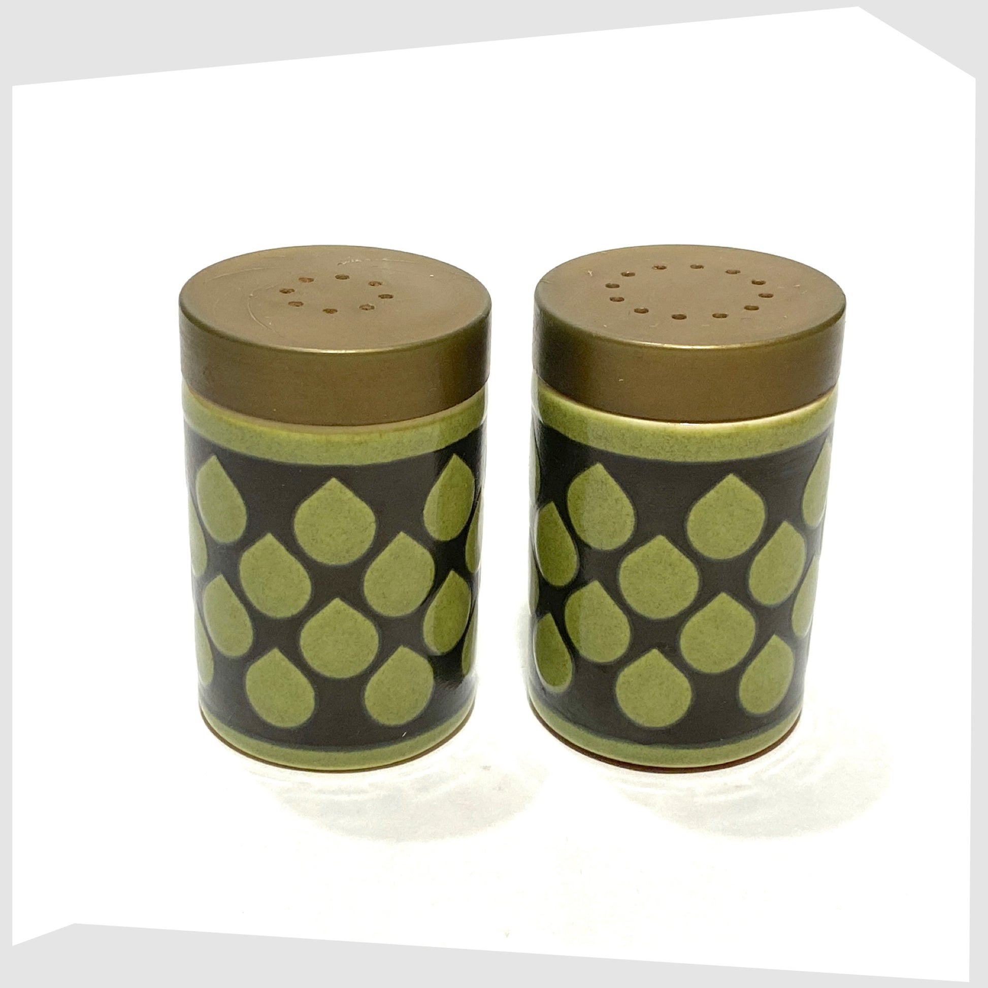1977 Hornsea Pottery Raindrop Cruet set, in green glaze with black raindrop design, finished with gold lids