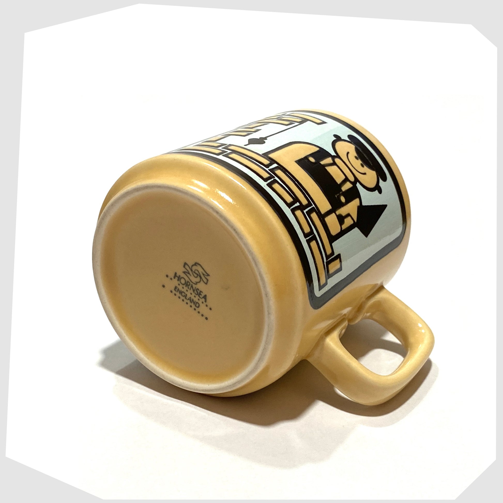 base of the Hornsea Pottery The Worlds Best Builder ceramic mug with John Clappisons illustration