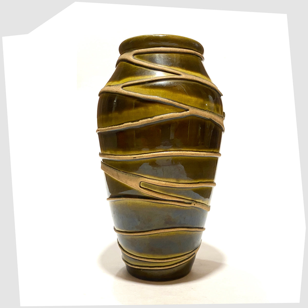 Ilkra Keramik 5/20 Vase finished in a rich green glaze with contrasting lines of matte clay, shown on a white background