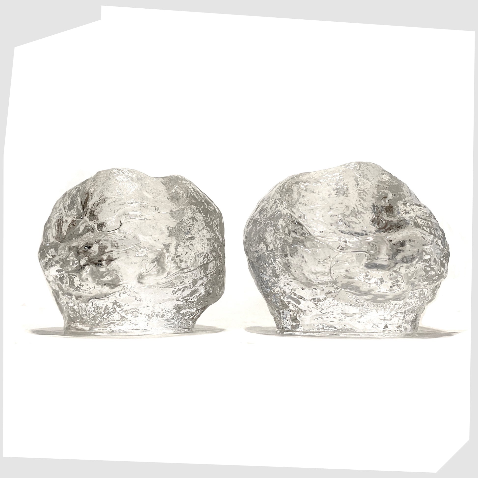Pair of Kosta Boda Snowball Tealight holders, made in clear textured glass, designed in 1973