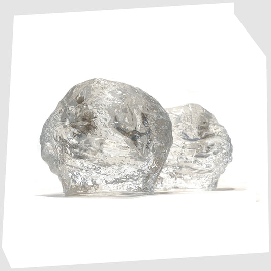 Pair of Kosta Boda Snowball Tealight holders, made in clear textured glass