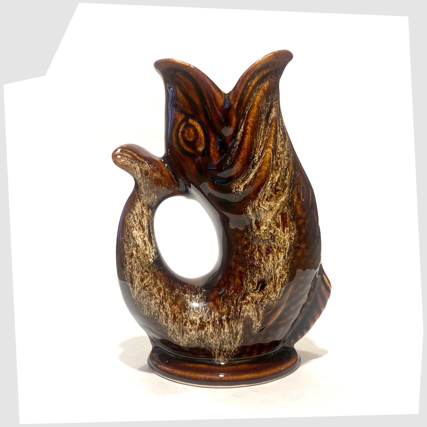 Fosters Studio Pottery Glugglr Jug in a chestnut brown with amber drip glaze, shown on a white background