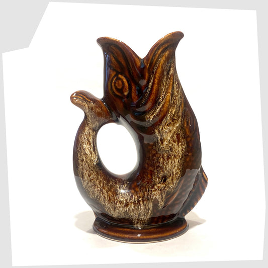 Fosters Studio Pottery Glugglr Jug in a chestnut brown with amber drip glaze, shown on a white background