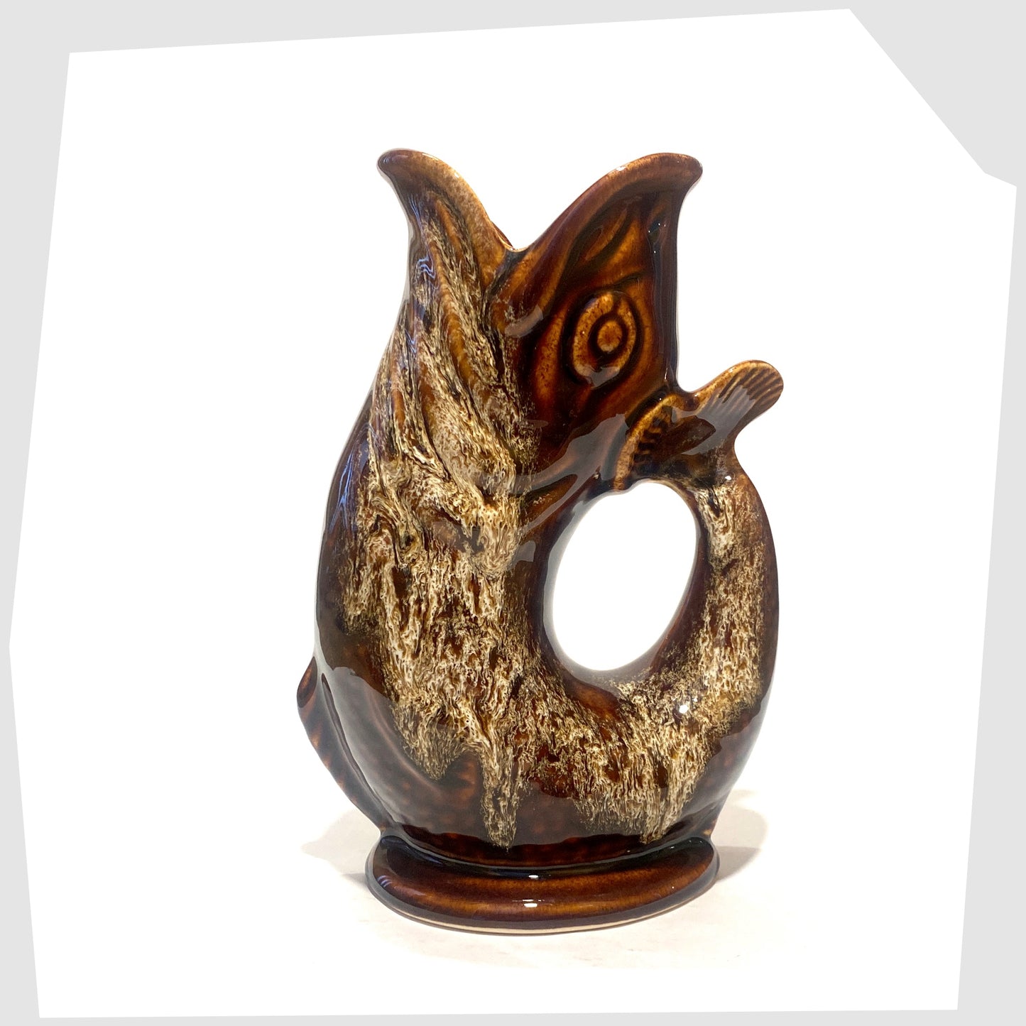 Vintage Fosters Studio Pottery Glugglr Jug in a chestnut brown with amber honeycomb drip glaze, shown on a white background