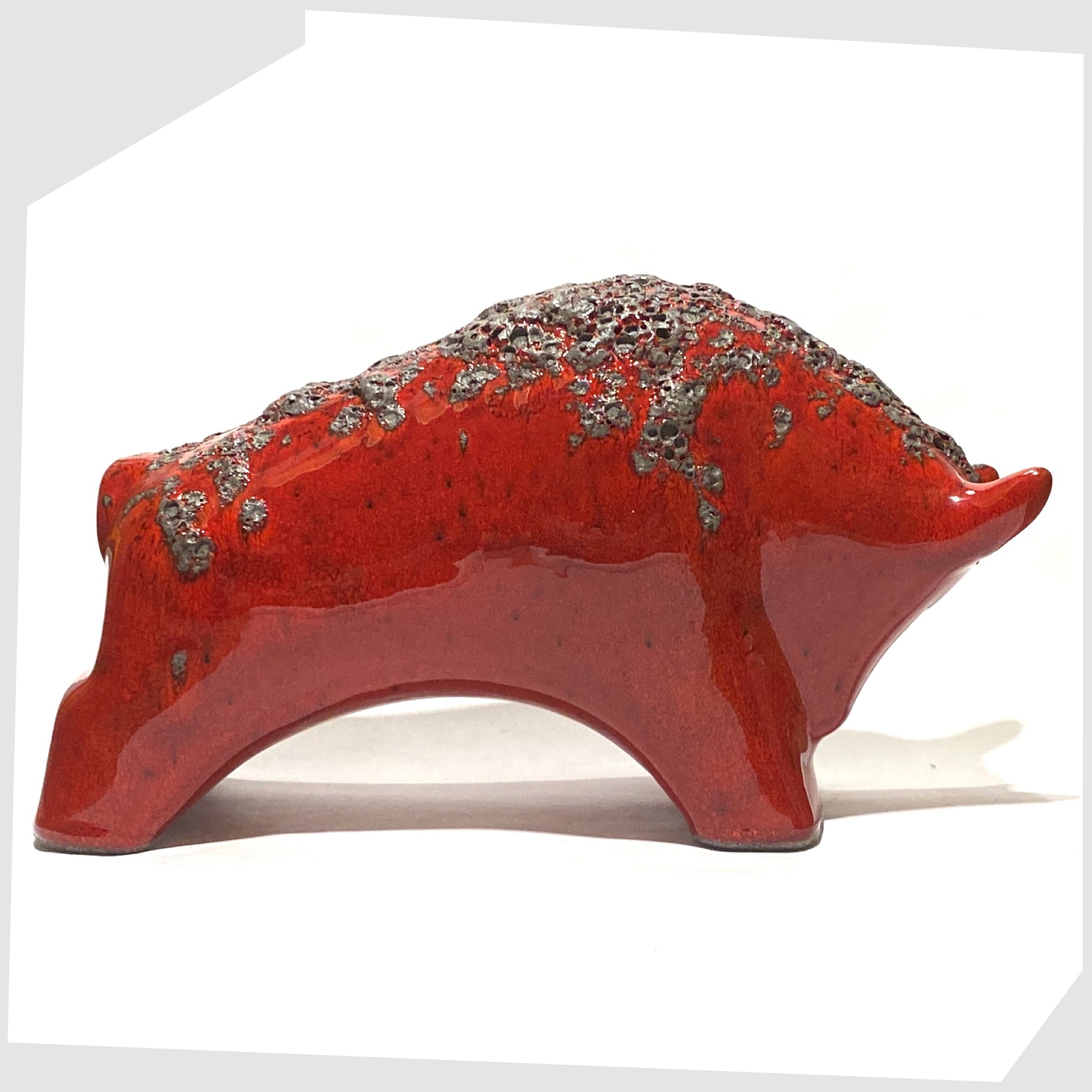 west german pottery-style otto keramik  bull in volcanic red fat lava glaze
