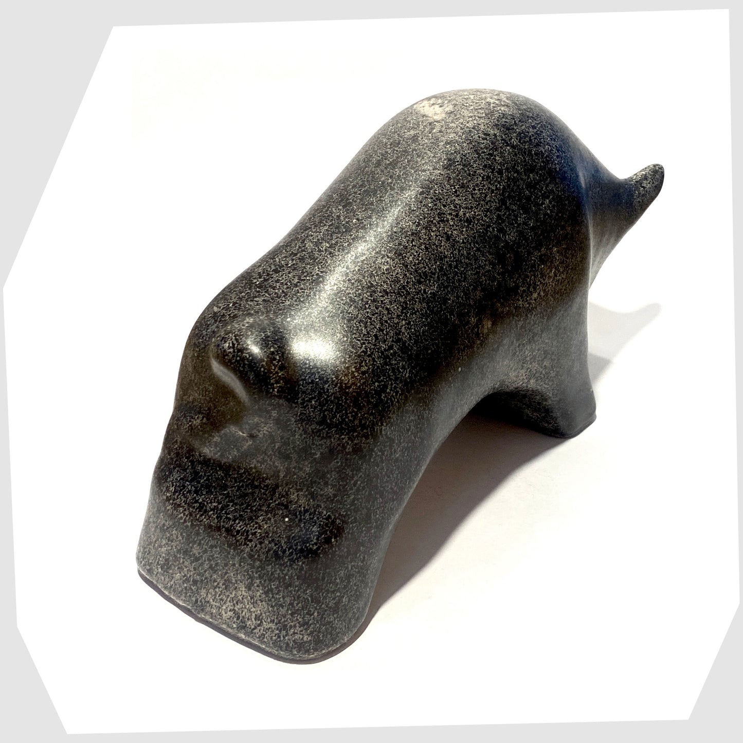 rear of the large otto keramik bull sculpture in bold black speckled glaze