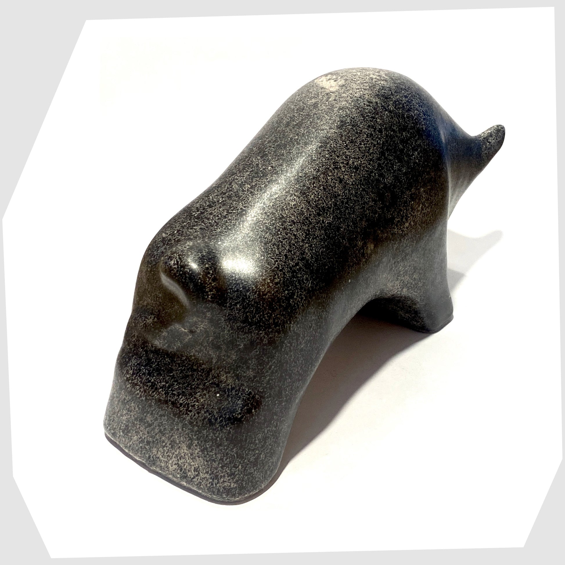 rear of the large otto keramik bull sculpture in bold black speckled glaze
