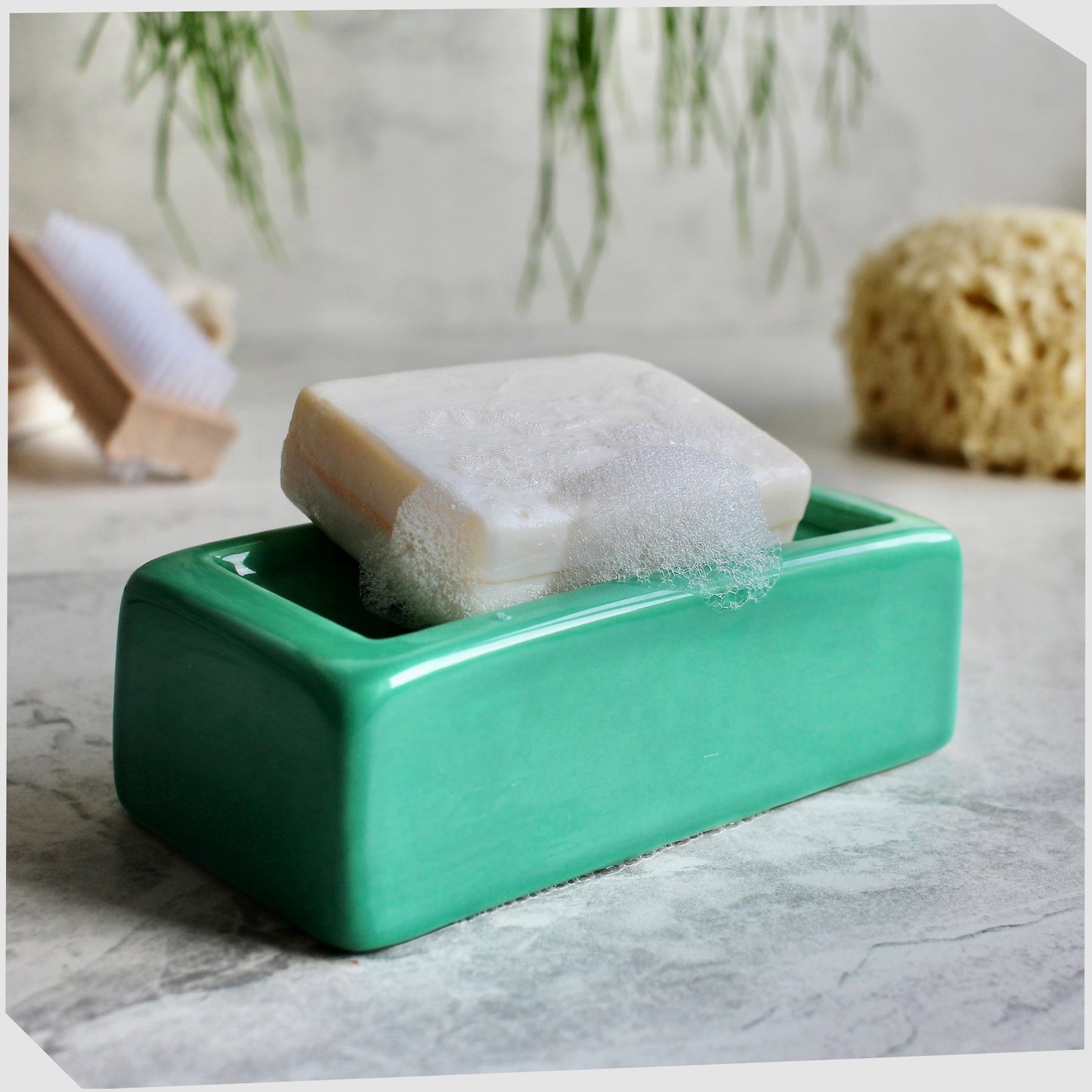 ceramic-soap-dish-in-the-shape-of-an-iconic-london-brick-in-green-glaze