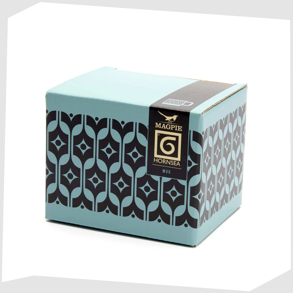 packaging box for the magpie x hornsea pottery Heirloom mug in a vibrant teal glaze