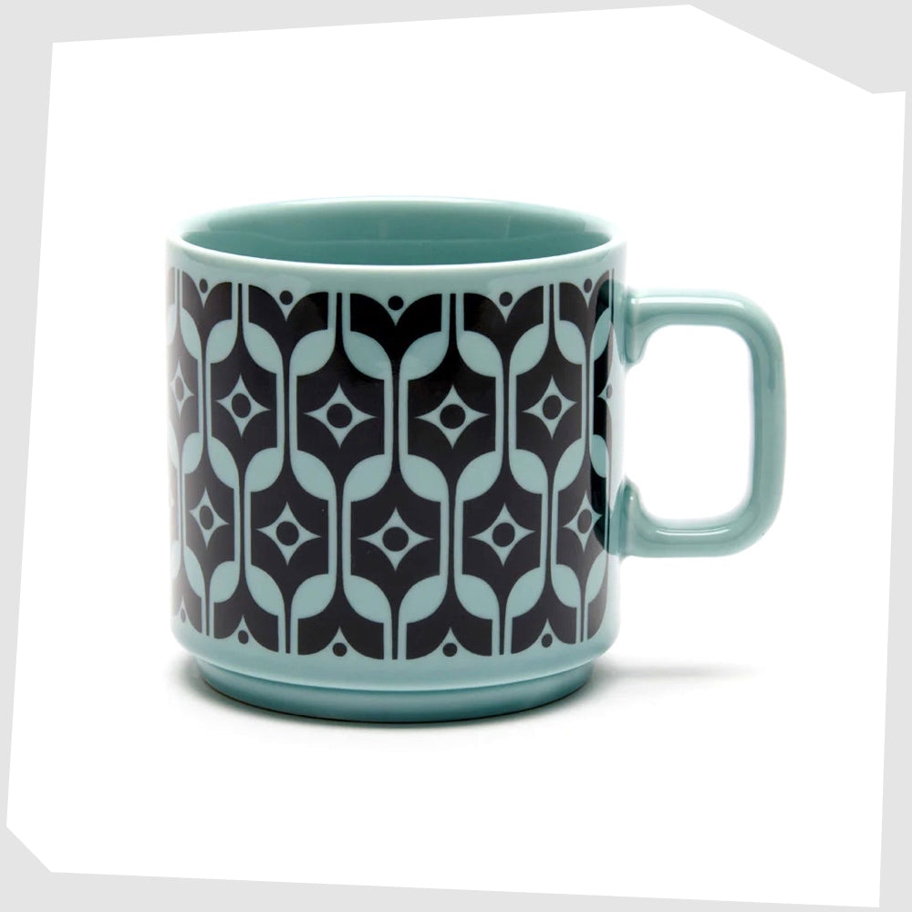 magpie x hornsea pottery Heirloom mug in a vibrant teal glaze with bold black pattern