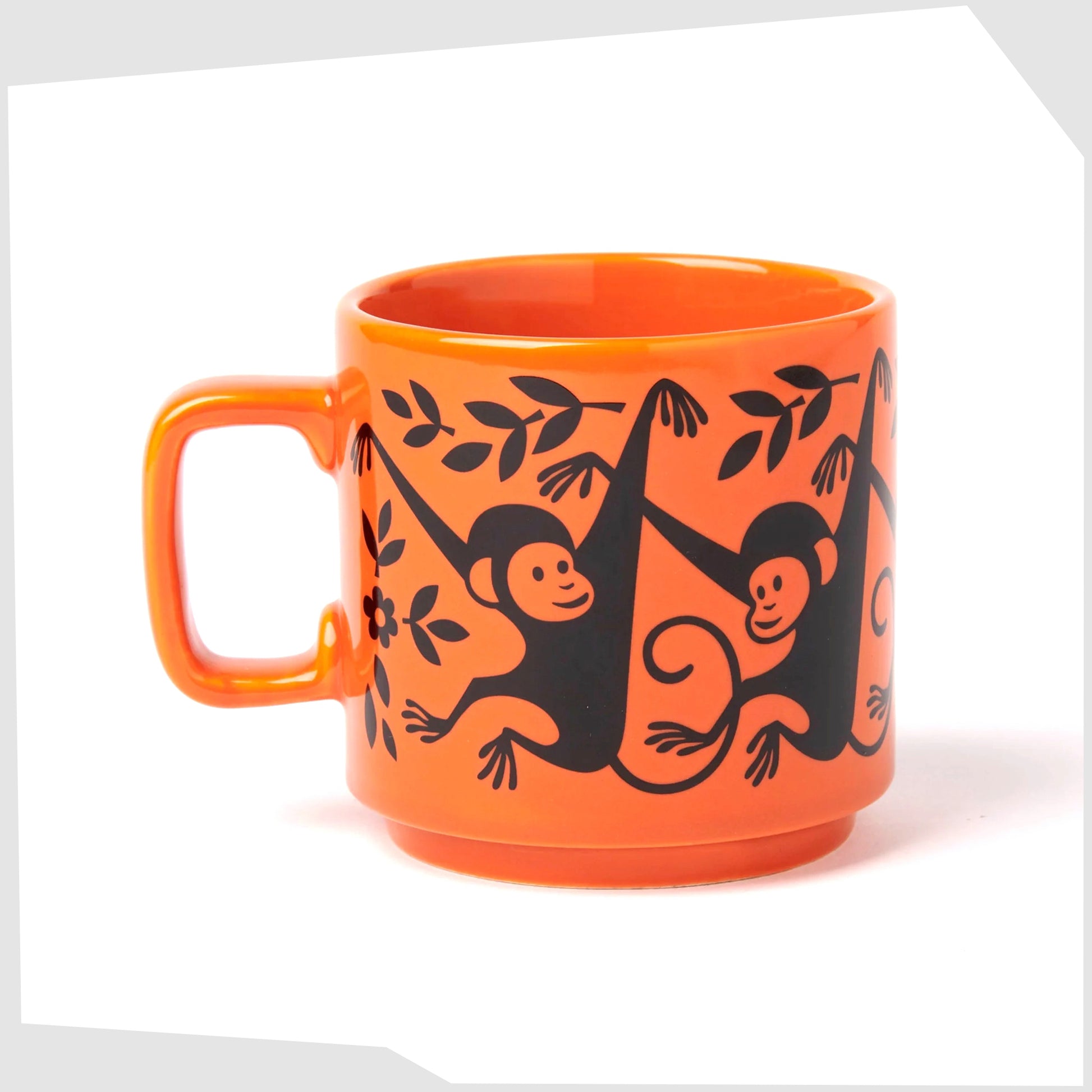 magpie x hornsea monkey mug, orange mug featuring a black print of a swinging monkey