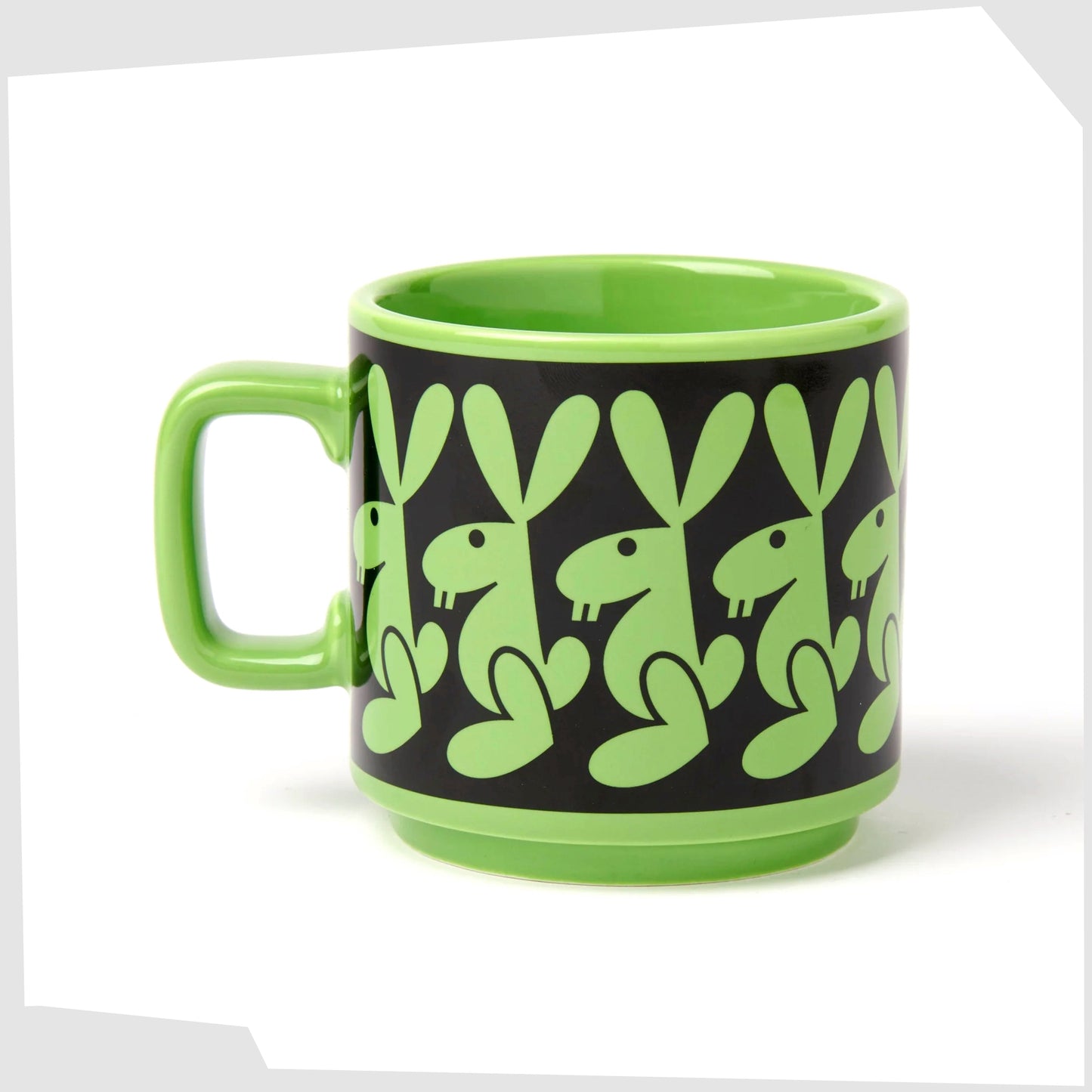 magpie x hornsea pottery rabbit mug. Green stoneware mug with black repeating pattern of a bunny rabbit.