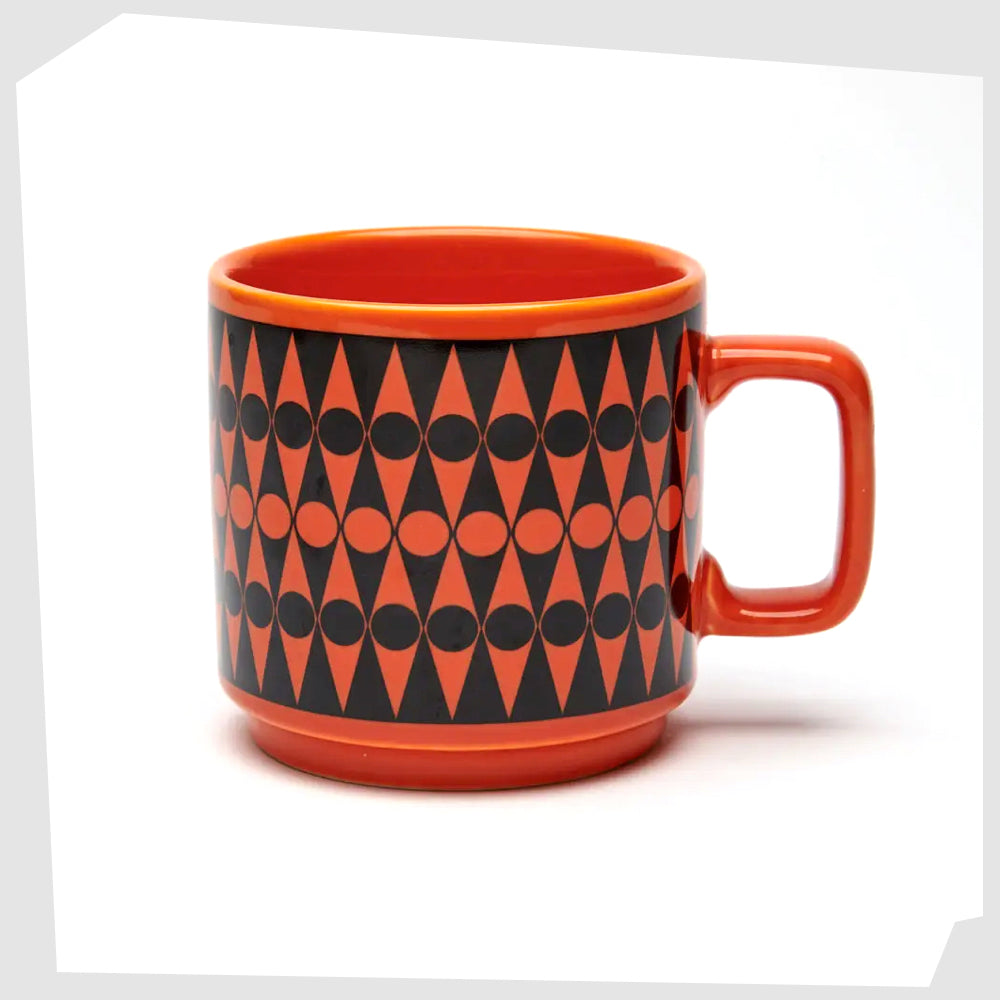 magpie-x-hornsea-pottery-mug-with-backgammon-print-on orange-glaze