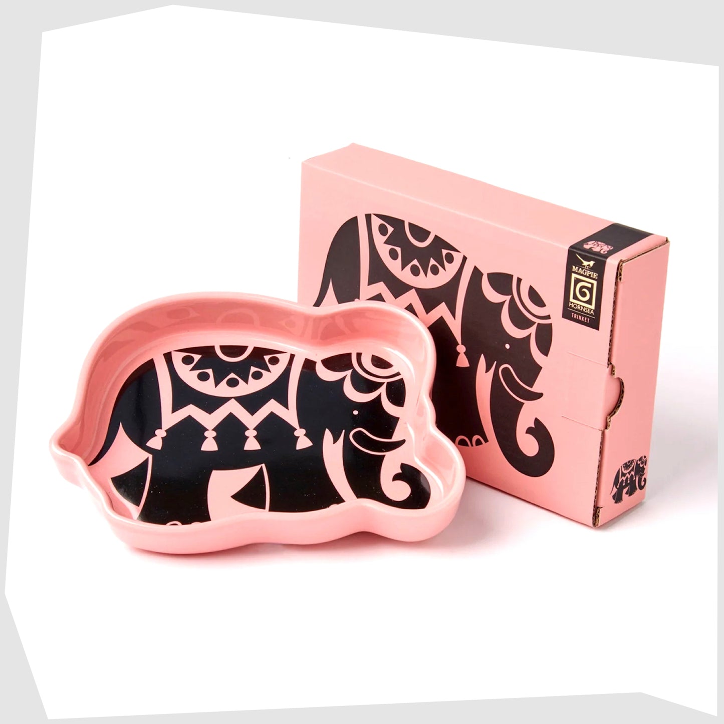 Magpie X Hornsea Elephant Trinket Tray, pink stoneware tray featuring a black print of an elephant, shown with its gift box packagaing