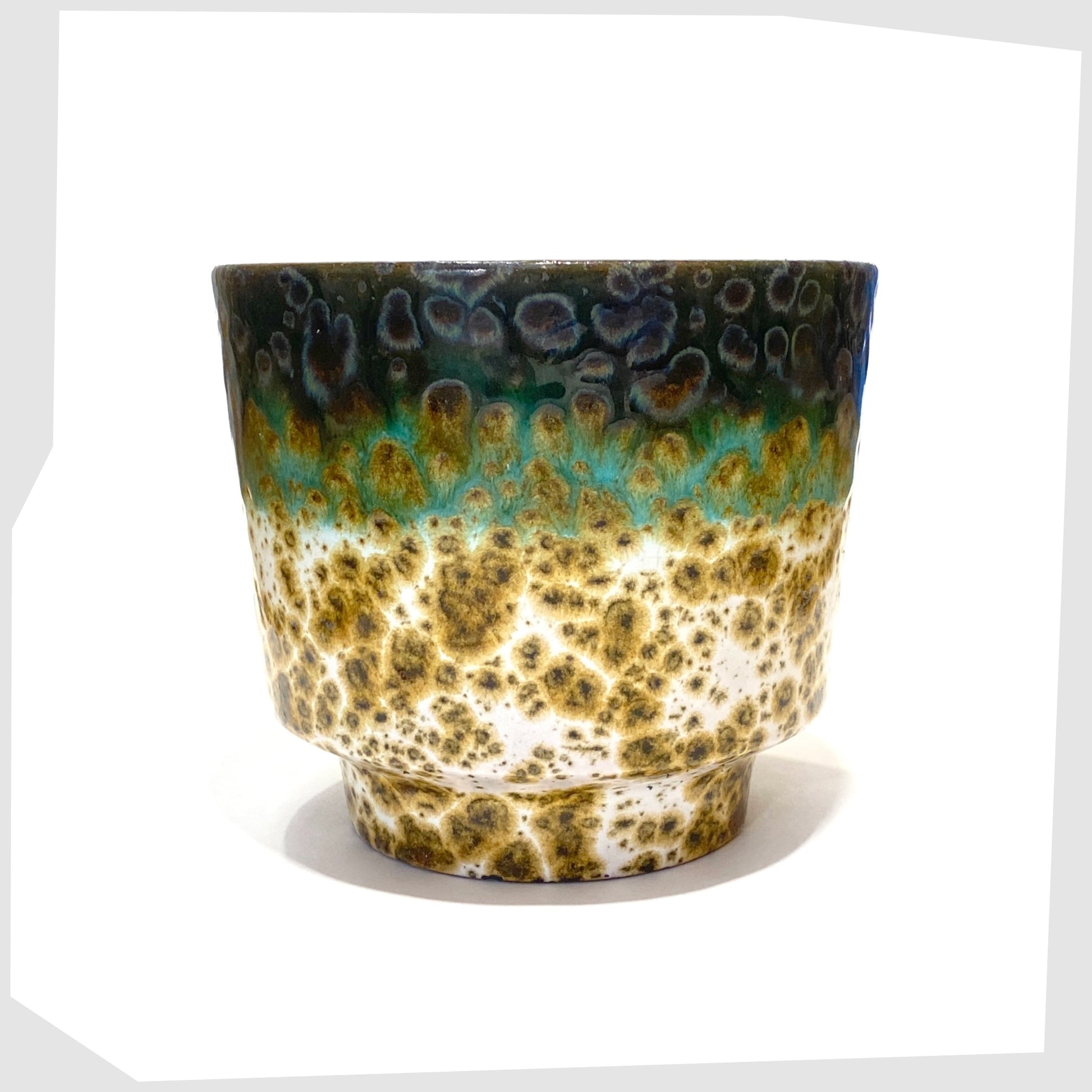 Marei Keramik Planter glazed in a fat lava with bands of green and navy glaze