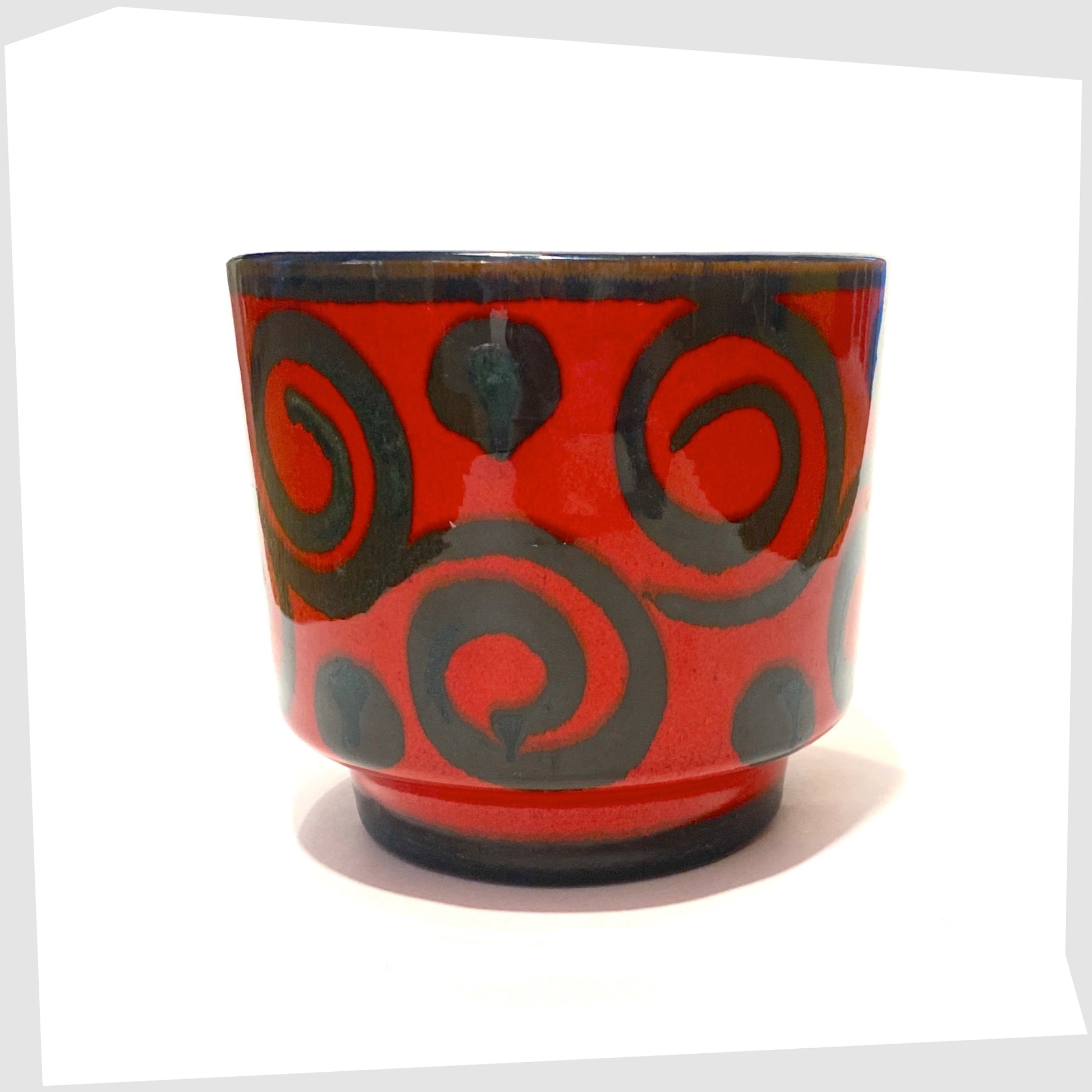 vintage marei keramik planter in a vivid red glaze with black swirling lines