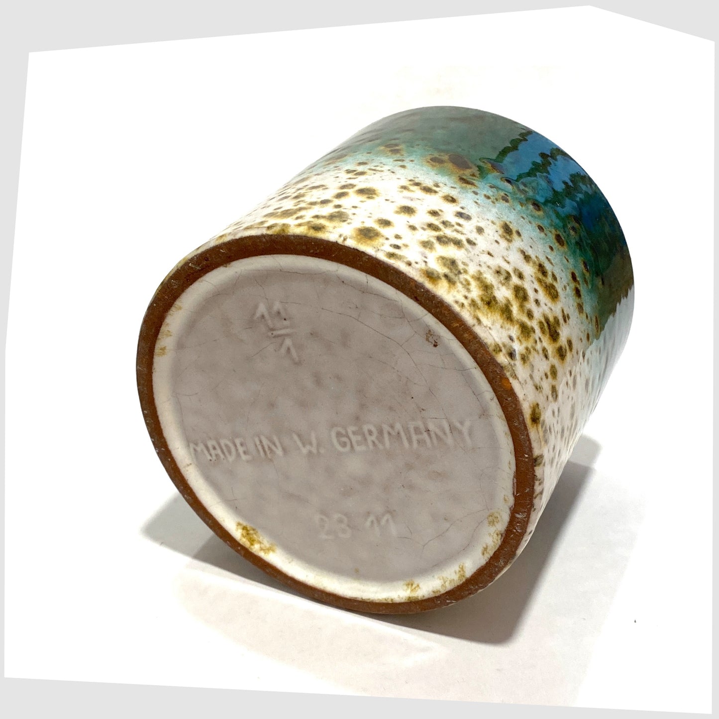 base of the Marei Keramik Planter in green and white speckled glaze