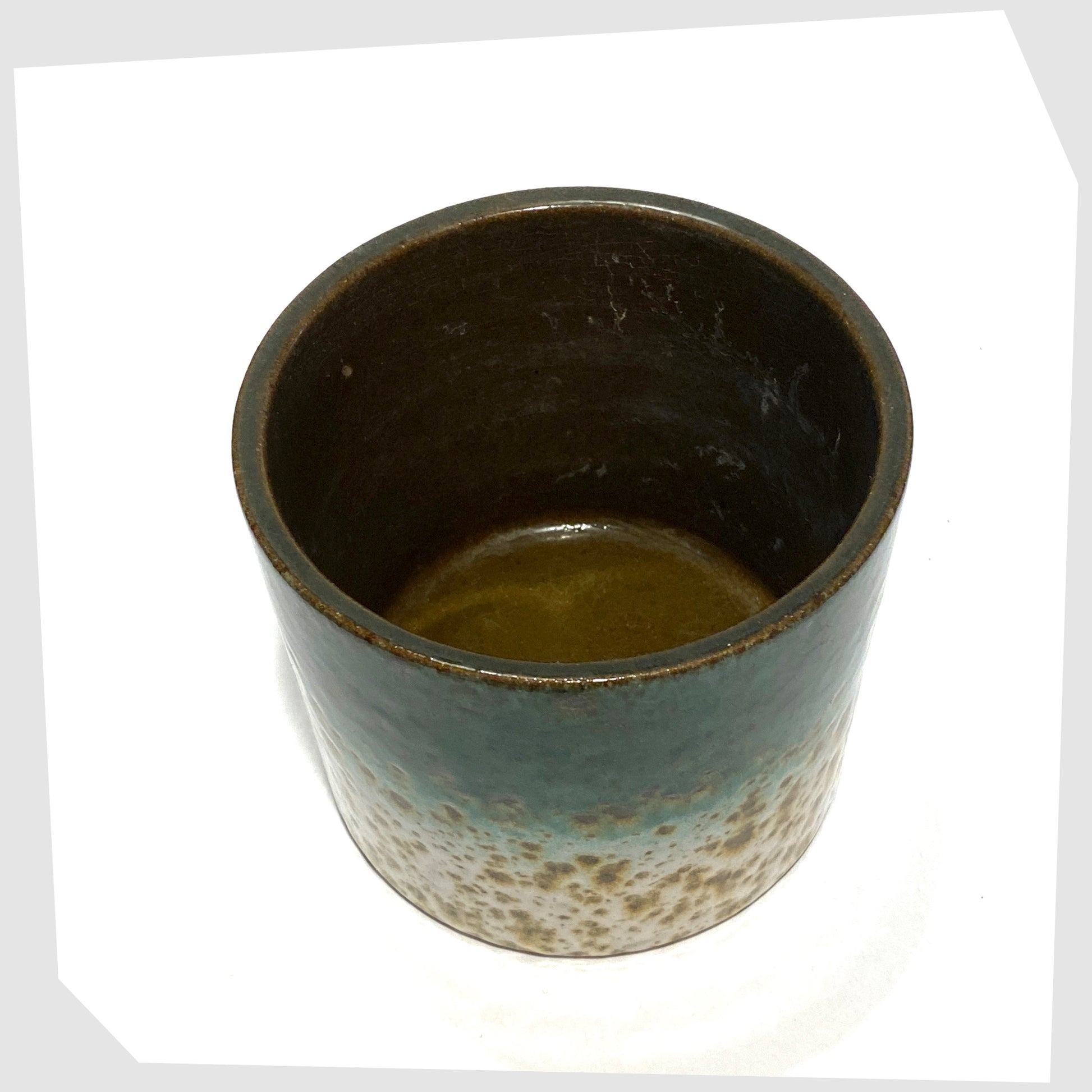 inner glaze on the Marei Keramik Planter in green and white speckled glaze