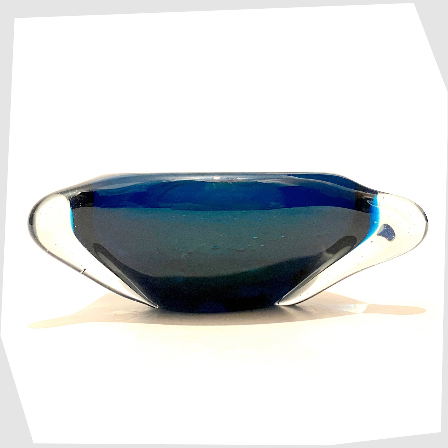 large mdina glass triangle dish in clear cased glass with blue inner