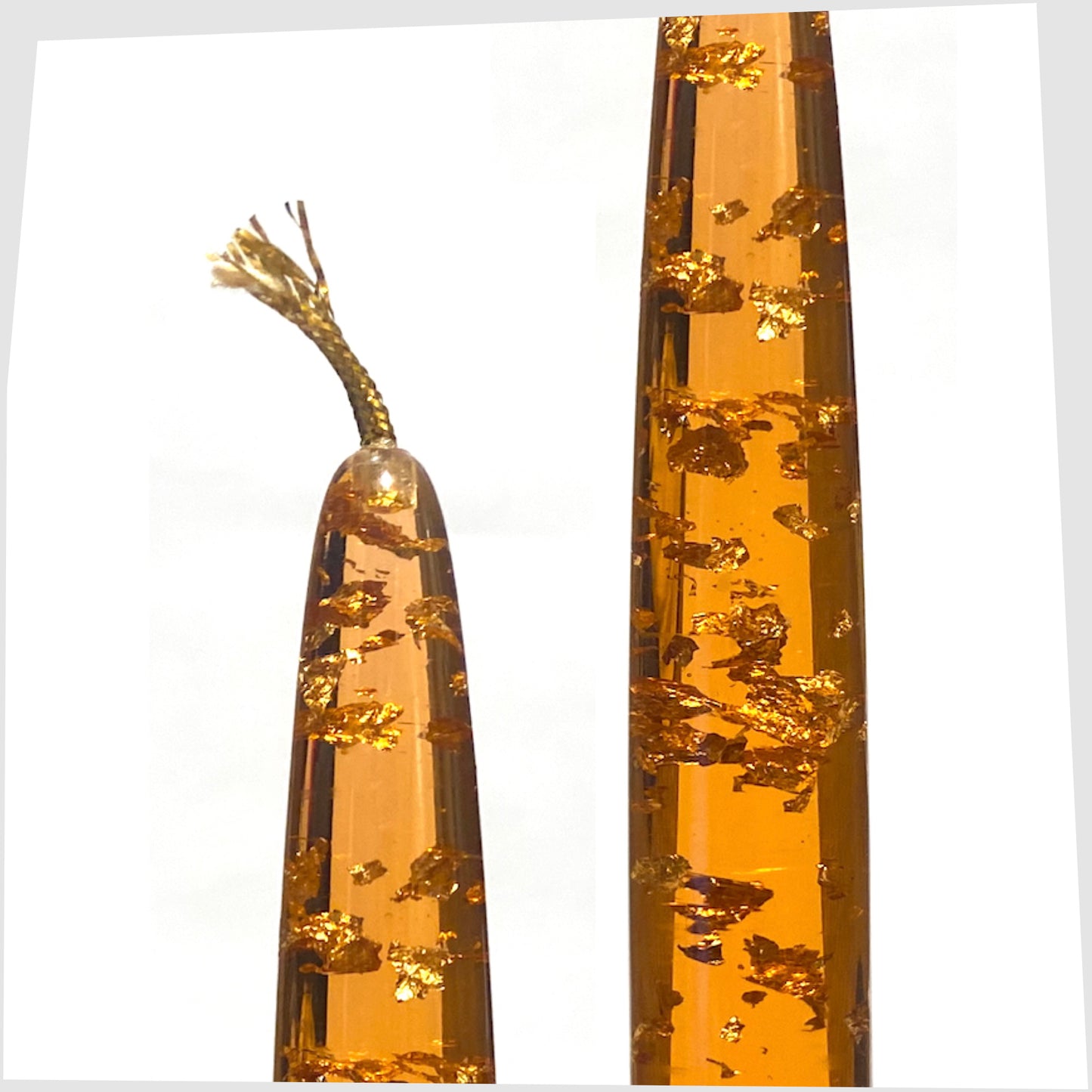 vintage lucite taper candle in orange acrylic with gold flecks