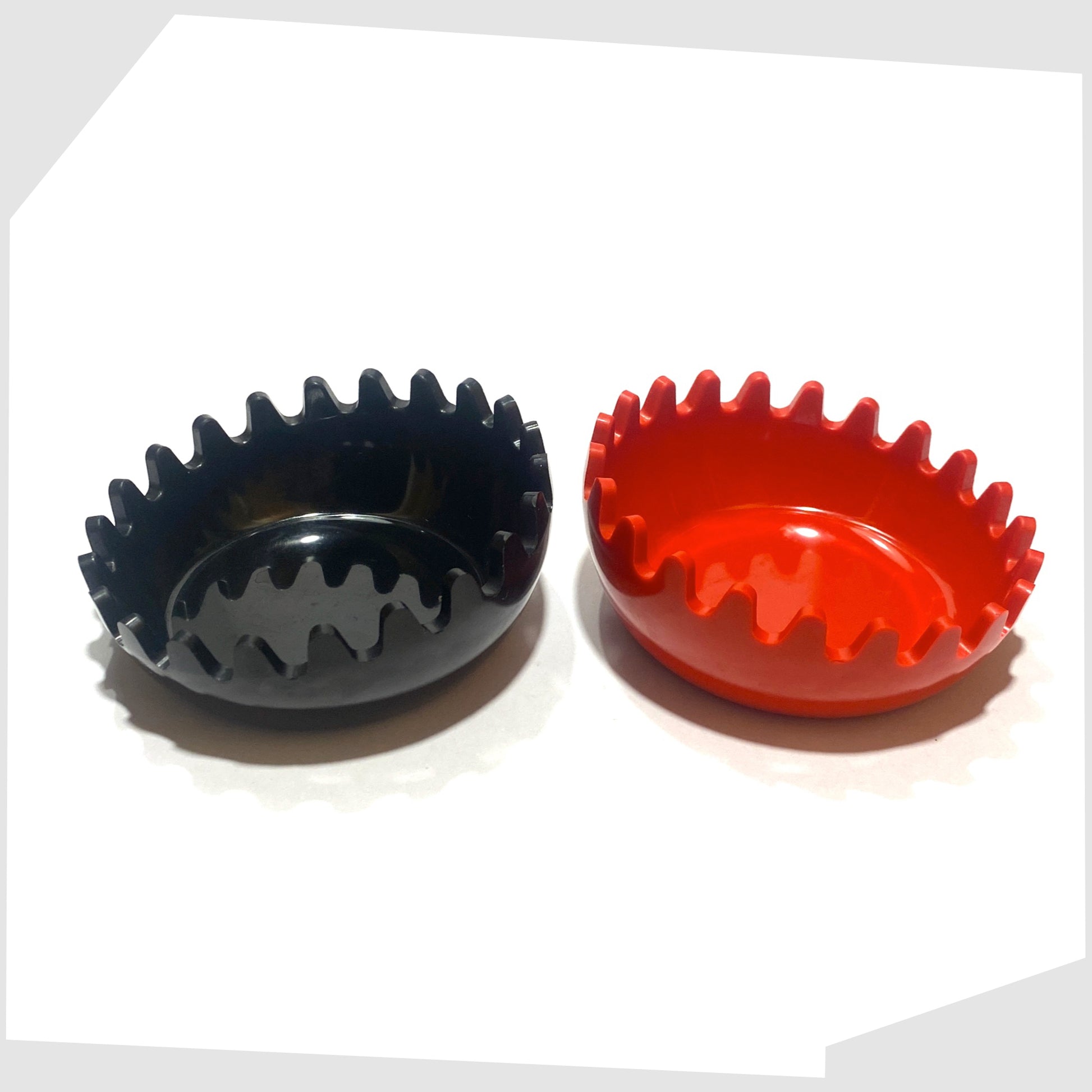 two red and black clam ashtray by Ornamin, West German, consisting of two interlocking clams with ribbed teeth