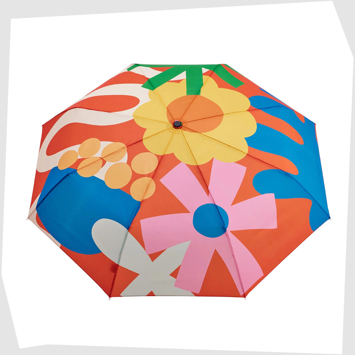 Open canopy of the Salsa Original Duckhead Umbrella in a red fabric with abstract and floral multicoloured shapes, shown on a white background