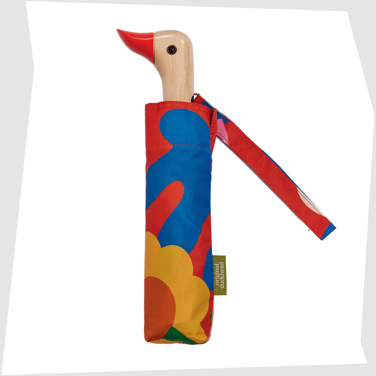Salsa Original Duckhead Umbrella in a red fabric with abstract and floral multicoloured shapes, shown closed on a white background