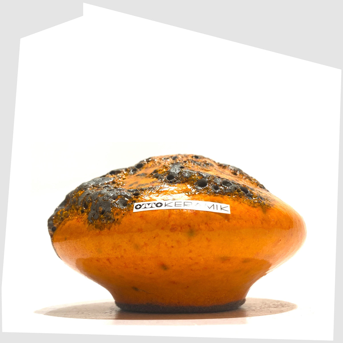 West German Pottery-style Otto Keramik Vase, model 203s, in orange glaze with grey fat lava, shown on a white background