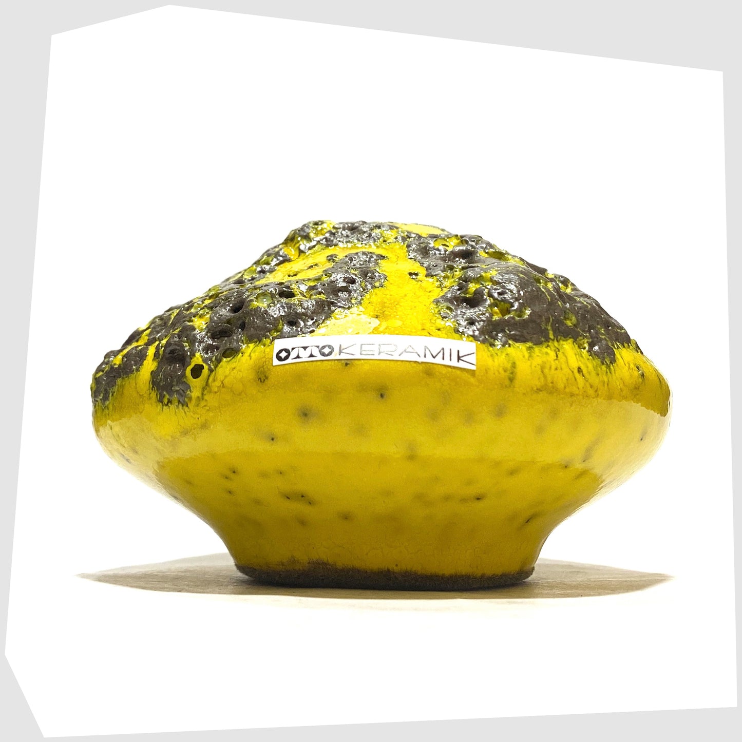 Otto Keramik 203 Vase in yellow with grey fat lava glaze, shown on a white background