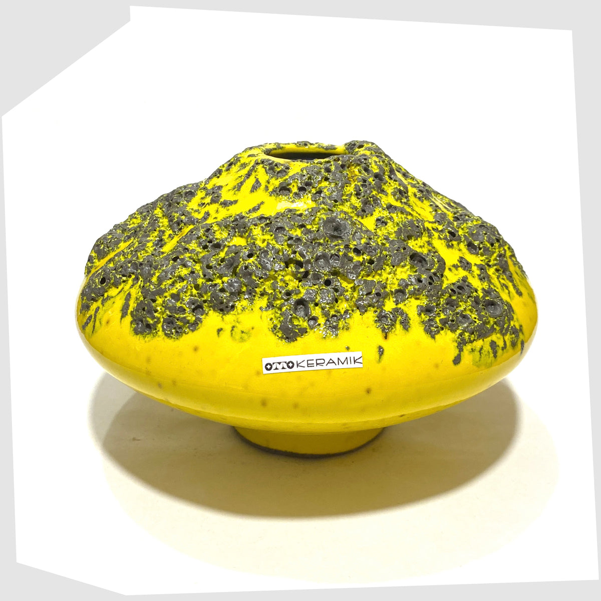 Otto Keramik Vase, model 203, in vibrant yellow glaze with grey fat lava, shown on a white background
