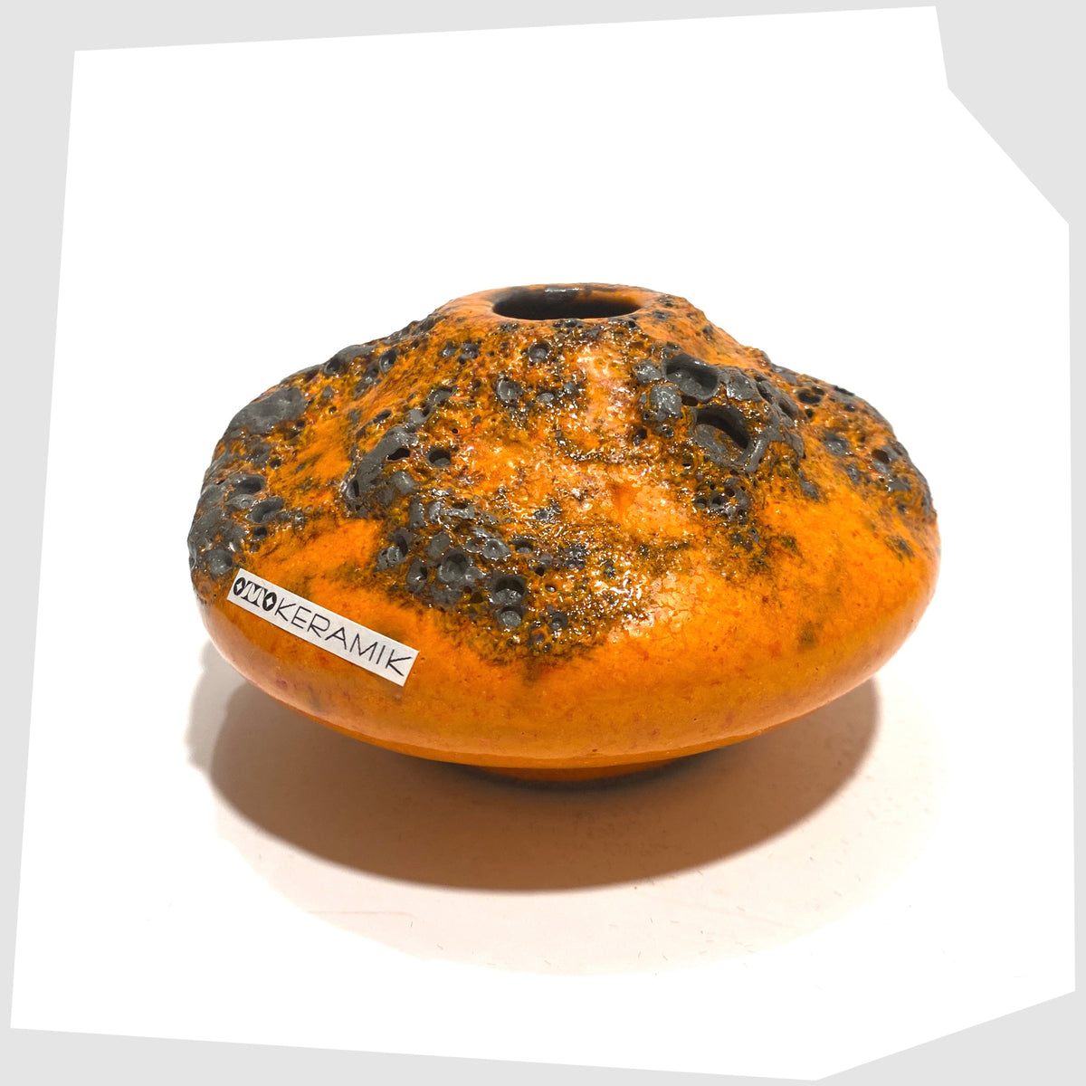 Otto Keramik 203 Vase in orange glaze with grey fat lava, shown on a white background