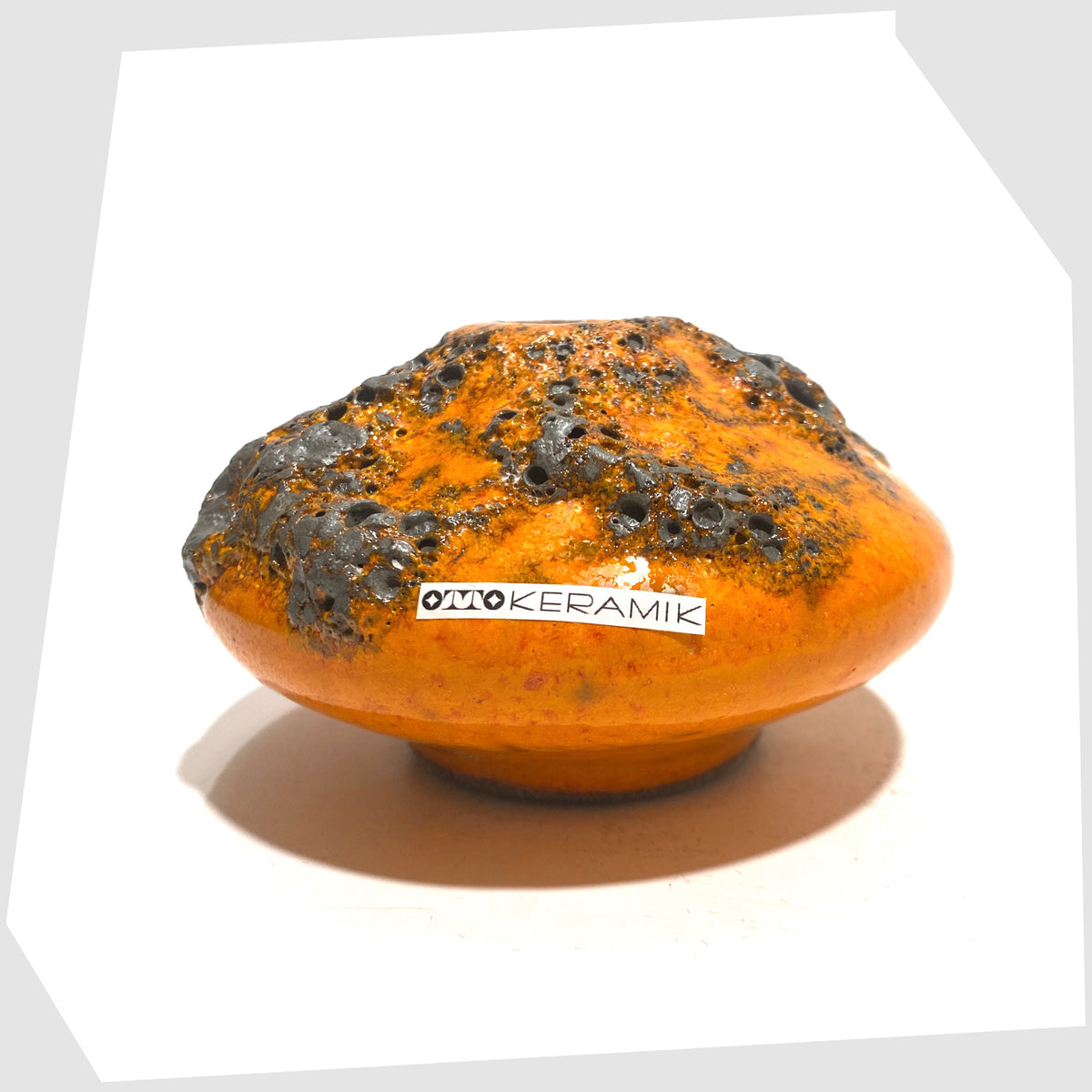 Otto Keramik Vase, model 203s, in orange glaze with grey fat lava, shown on a white background