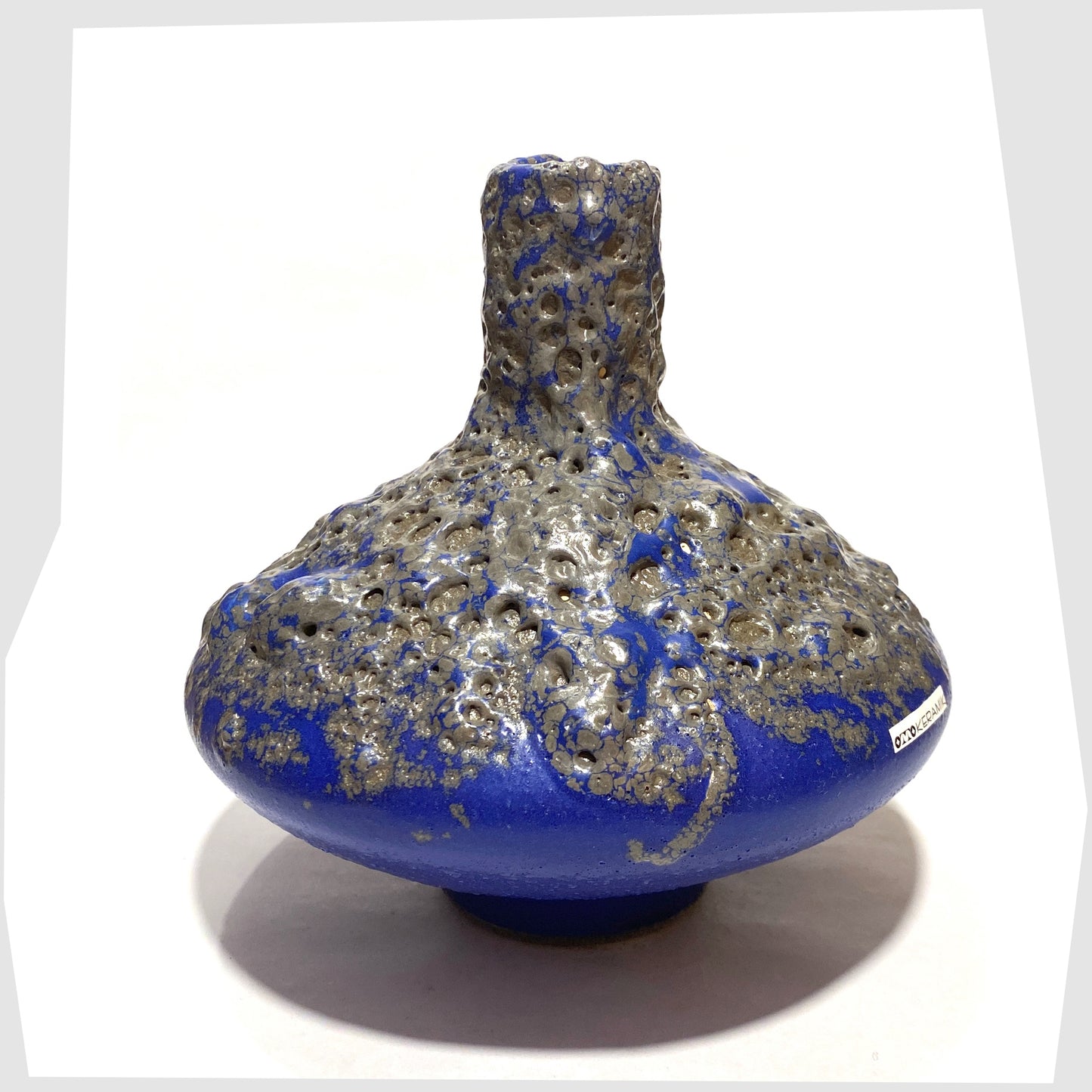 Otto Keramik 206M Vase in a vivid blue colour with grey fat lava glaze, shown on a white background