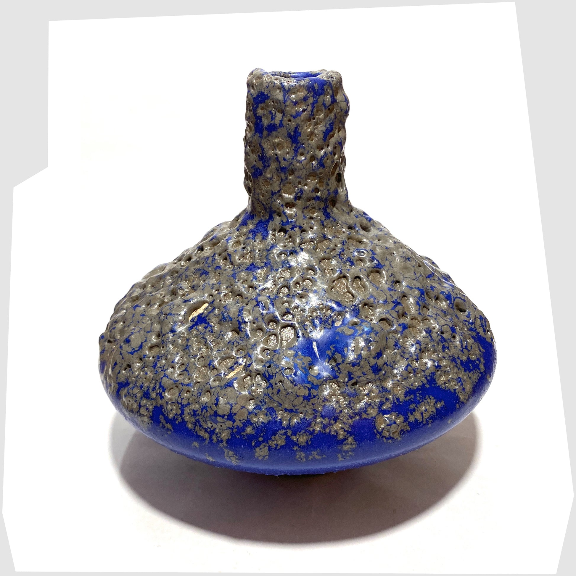 Upper section of the Otto Keramik 206 Vase in a vivid blue colour with grey fat lava glaze, shown on a white background