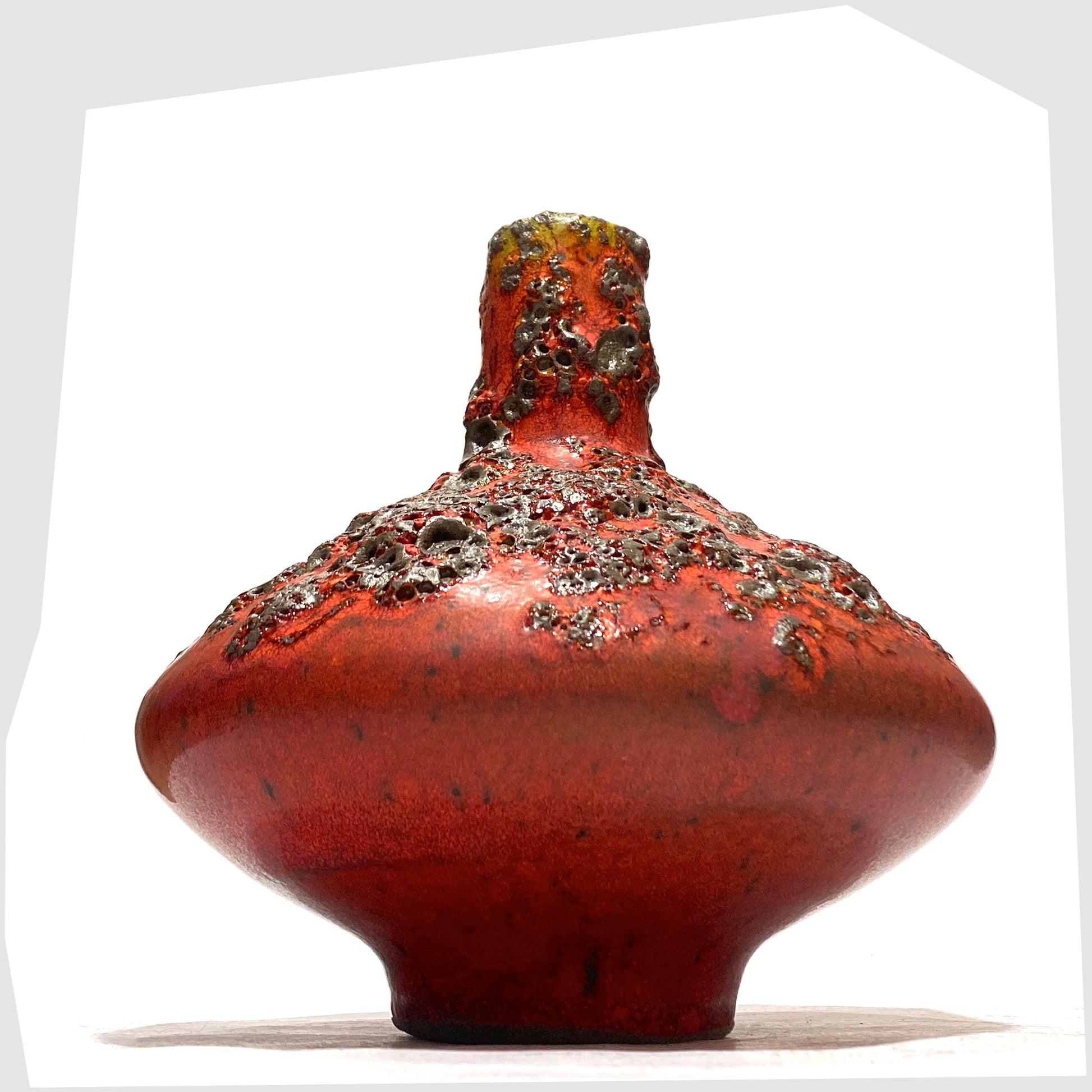 Otto Keramik 206 Vase in a rich red glaze with yellow hues around the rim and deep fat lava glazing, shown on a white background