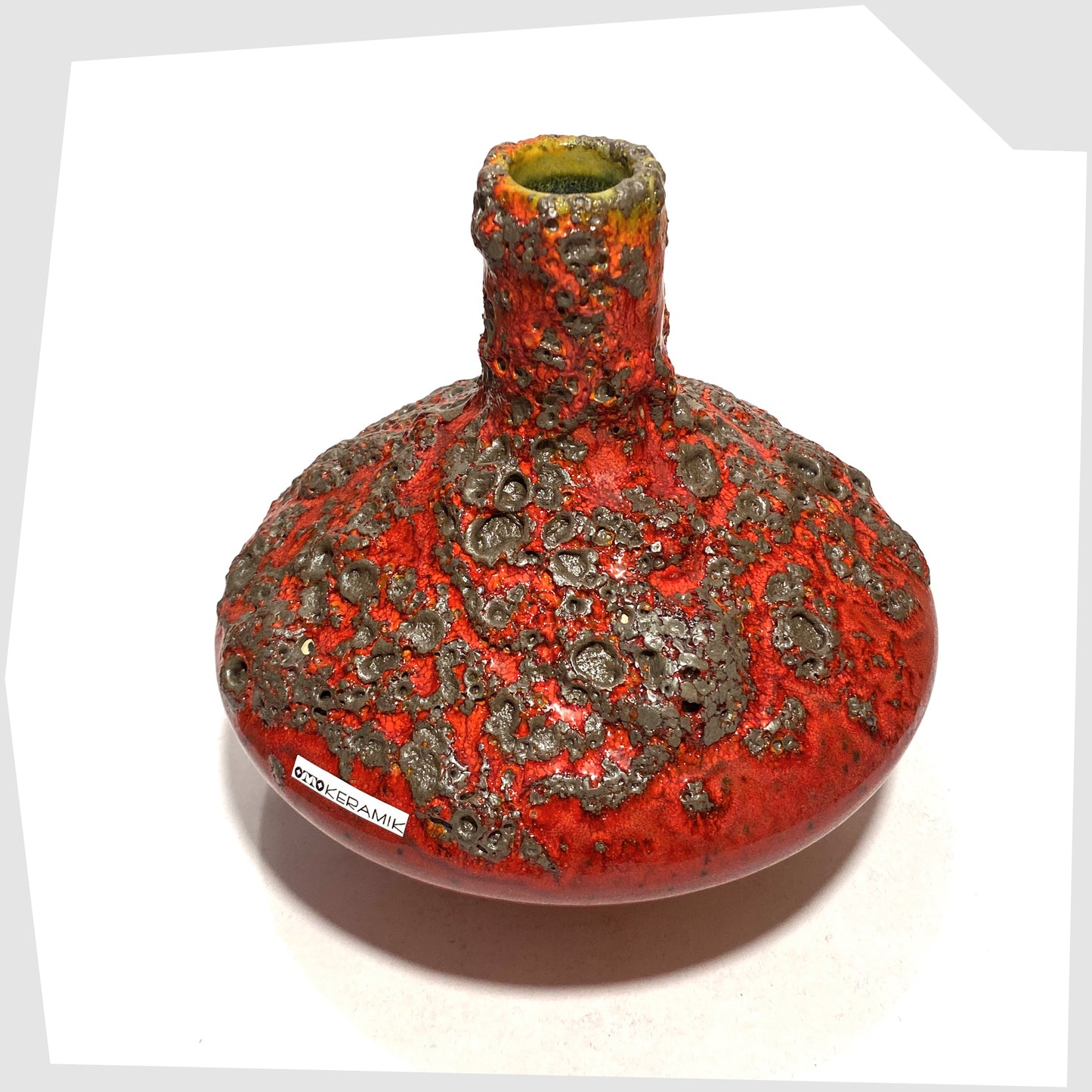 West German Pottery-inspired Otto Keramik 206 Vase in a rich red glaze with yellow hues around the rim and deep fat lava glazing, shown on a white background