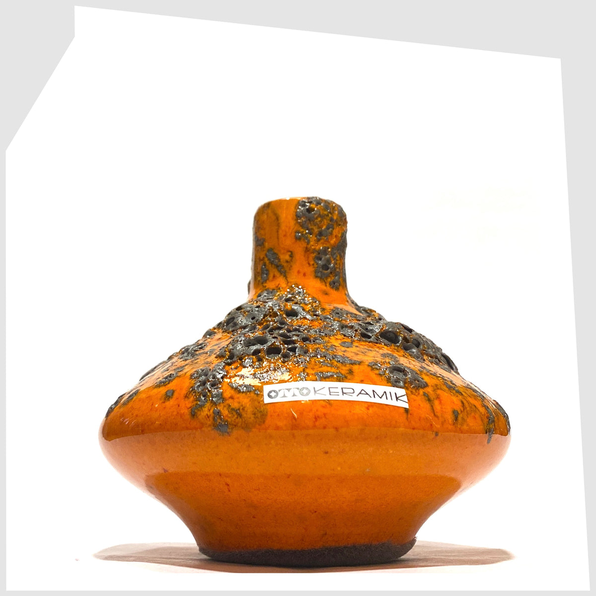 Otto Keramik 206s Ceramic Vase in a vibrant orange glaze with grey fat lava, shown on a white background