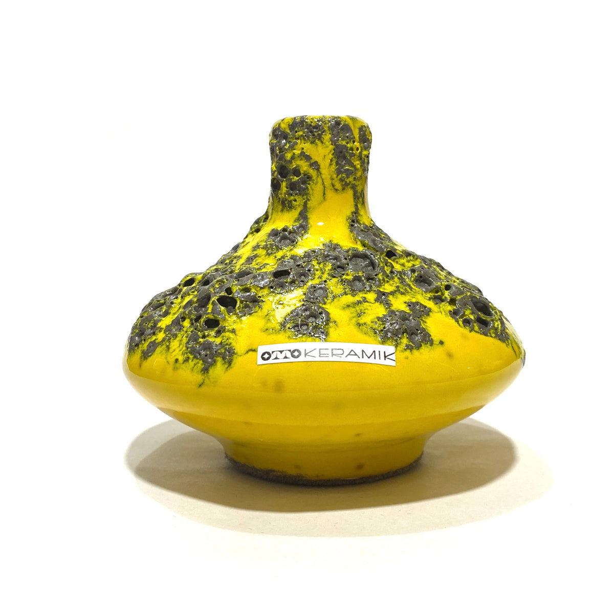 Otto Keramik 206s Vase in a vibrant yellow glaze with grey fat lava, shown on a white background