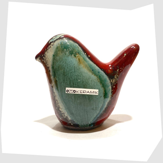 otto keramik ceramic bird sculpture in bolivia glaze of dark red and rich sea green