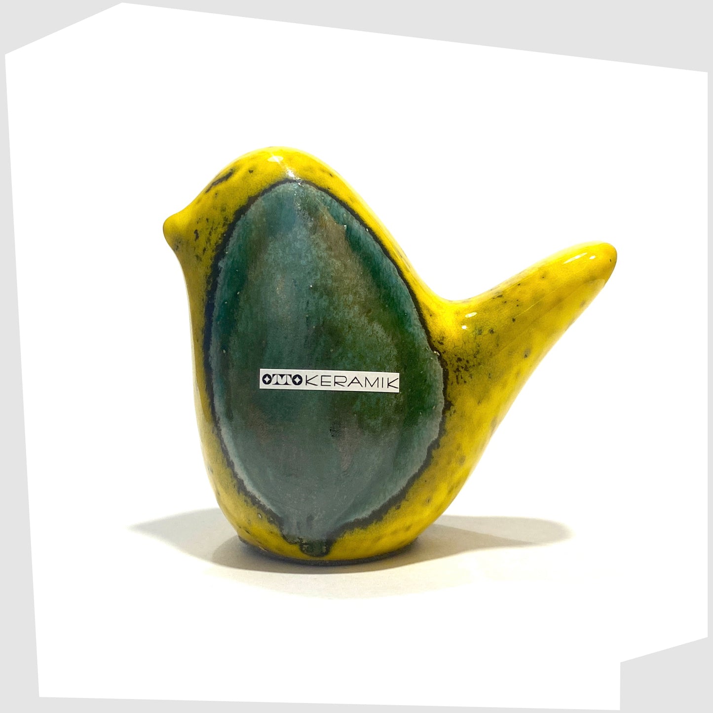 otto keramik ceramic bird sculpture in brazil glaze of vibrant yellow and sea green glaze