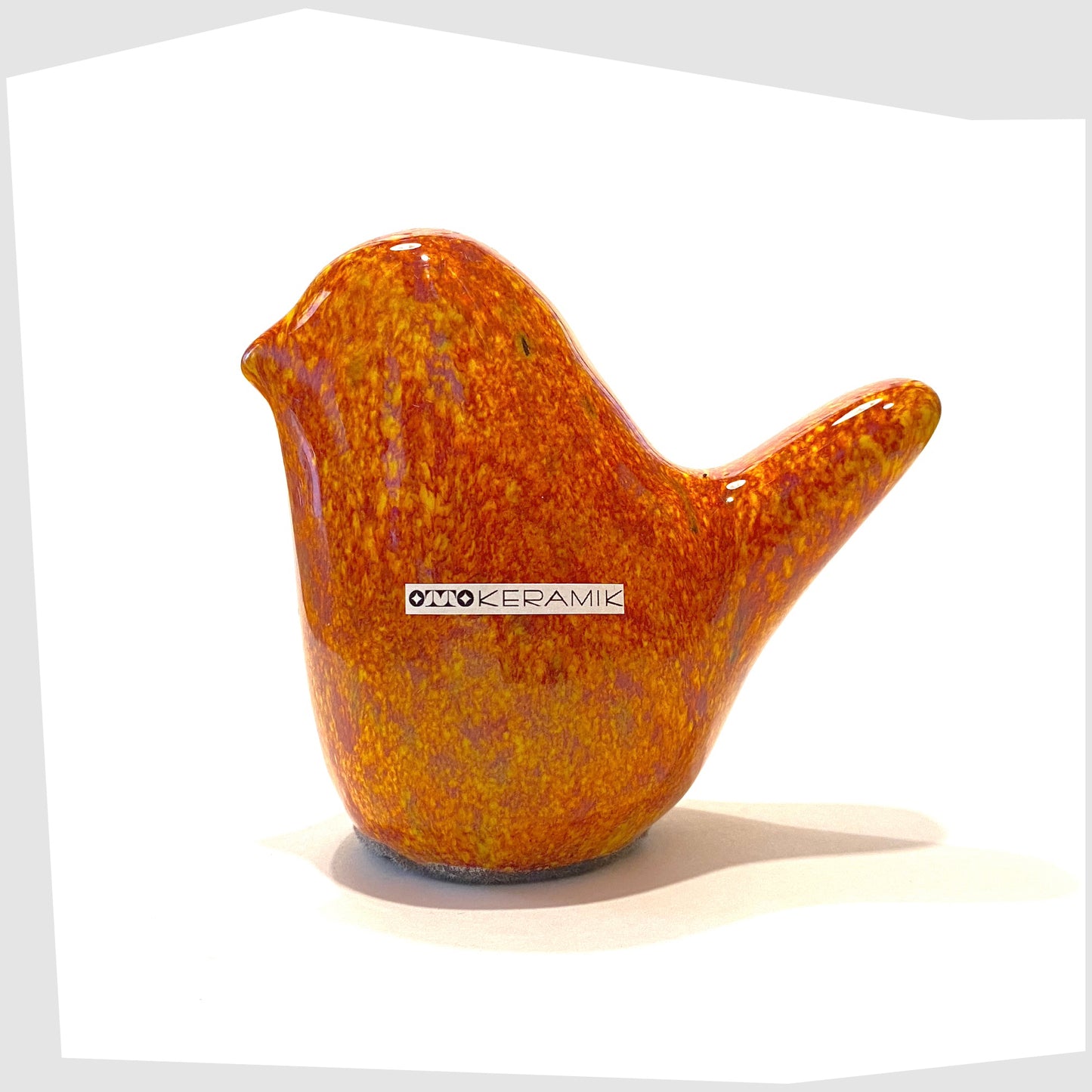 otto keramik ceramic bird in fire glaze of orange, red and yellow speckles