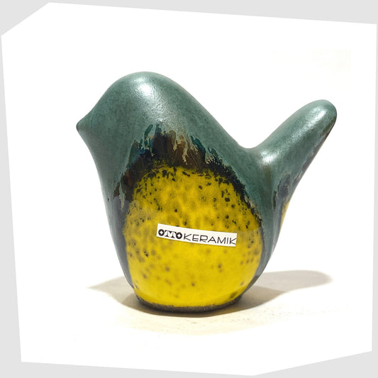 otto keramik bird sculpture in sea green drip glaze over a vibrant yellow base