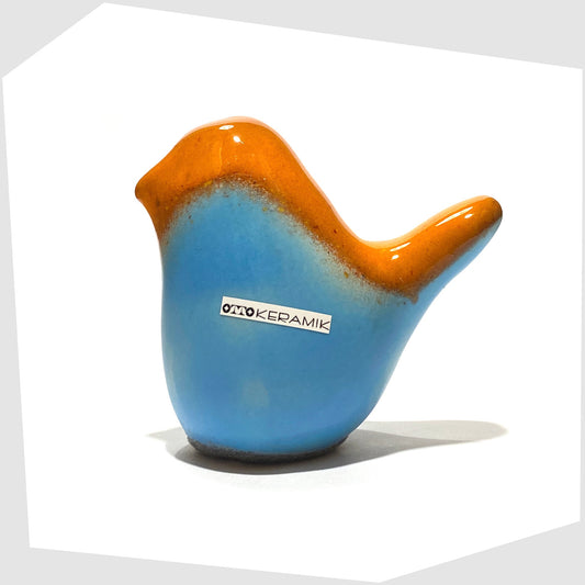 otto keramik ceramic bird ornament in orange over light blue glaze